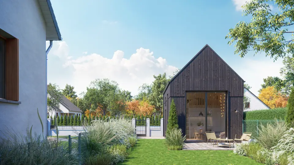 Image de synthèse : studio de jardin indépendant à bardage en bois brûlé, vu depuis la maison